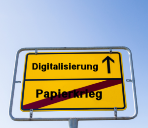 Schild in Richtung Digitalisierung und Ortsende Papierkrieg